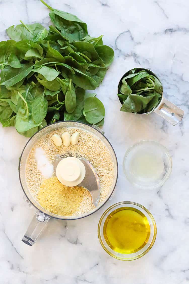 Vegan pesto ingredients laid out. 