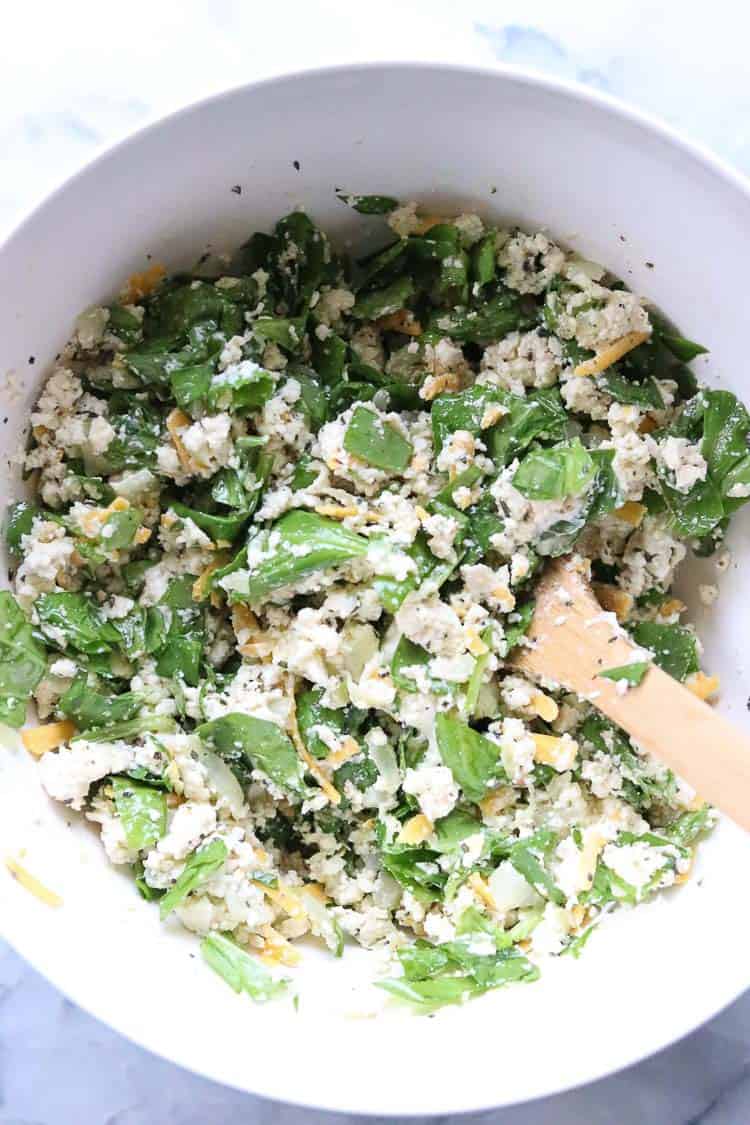 Vegan ricotta and spinach stuffed shell filling in a bowl.