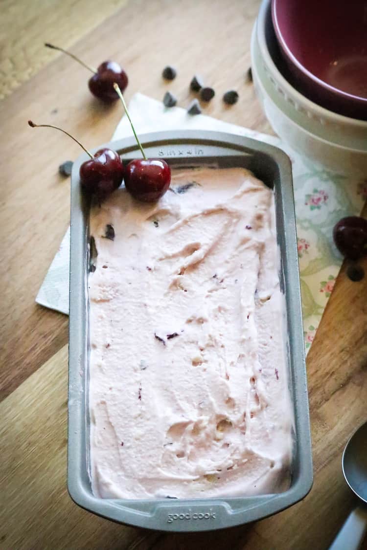 Vegan cherry ice cream in a loaf pan.