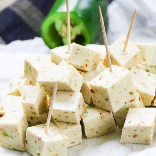 side view of vegan pepper jack cheese chunks on toothpicks