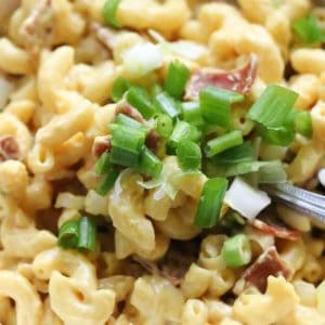 Overhead shot of vegan bacon mac and cheese in a white bowl.