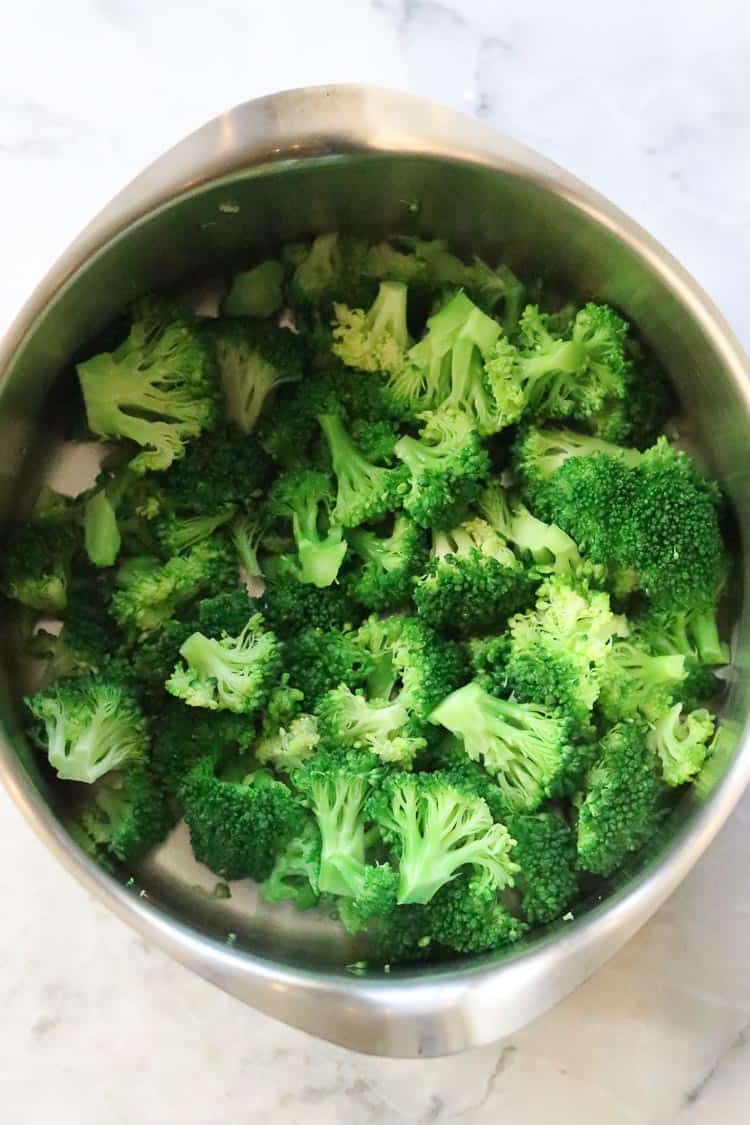 overhead shot of lightly steamed broccoli in a pot