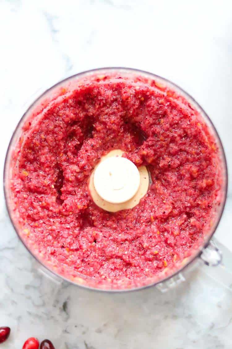 raw cranberry relish in a food processor