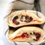 overhead shot of vegan calzones turned with open face