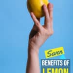 side shot of hand holding a lemon for pinterest graphic