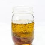 side shot of vegan italian dressing in a jar