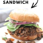 side overhead shot of pulled mushrooms sandwich with text overlay for pinterest