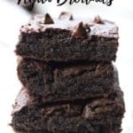 side view of stacked vegan brownies with text overlay for pinterest
