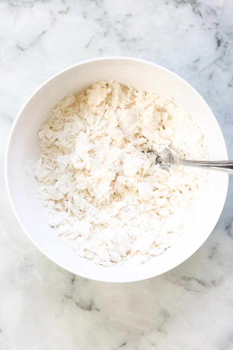 Bowl of flour mixed with coconut cream.