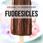 side shot of vegan fudgesicle being held with text overlay for pinterest