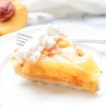 side closeup shot of fresh vegan peach pie