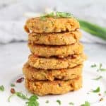 stack of vegan chickpea burger patties on a plate