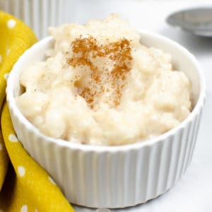 close up of cinnamon rice pudding in a ramekin