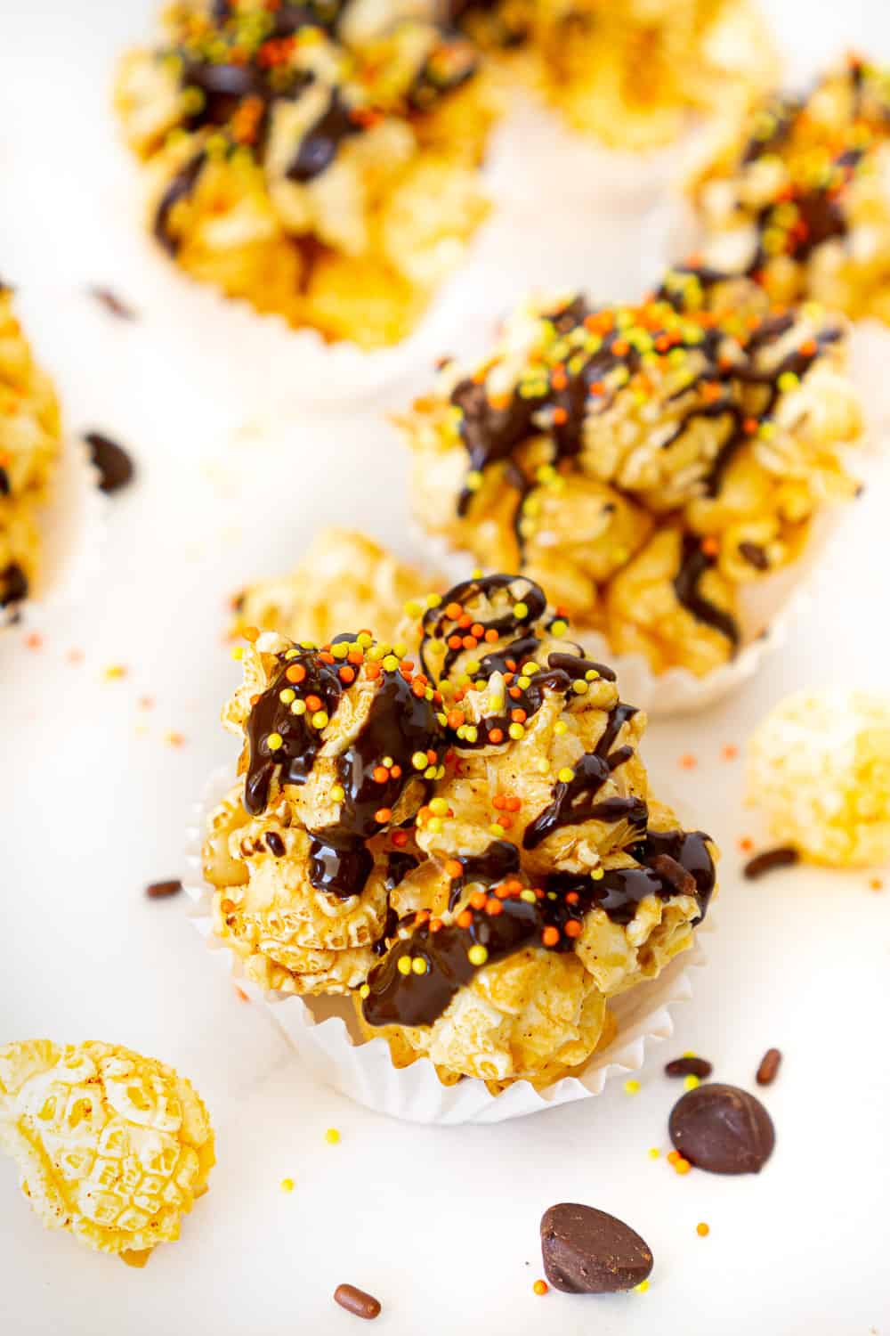 dark chocolate popcorn balls with thanksgiving sprinkles in dessert cups