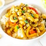 white bowl with cashew, celery, pineapple stir fry