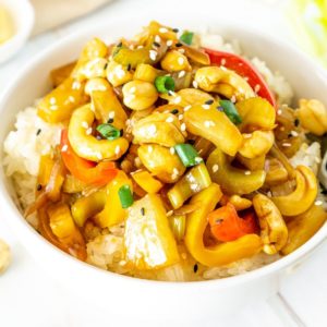 white bowl with cashew, celery, pineapple stir fry