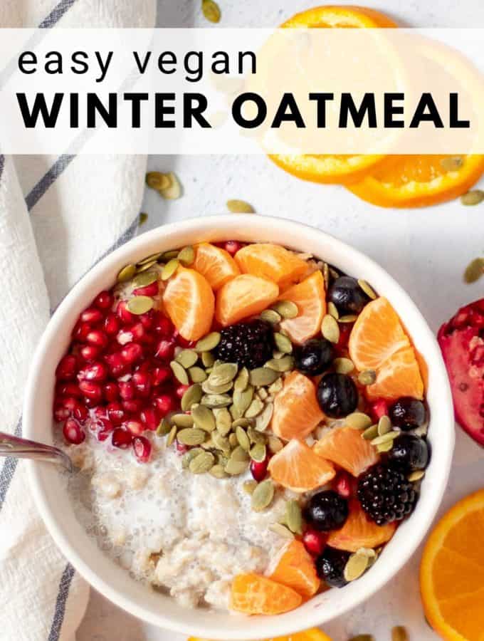 bowl of vegan oatmeal with pomegranate and fruit