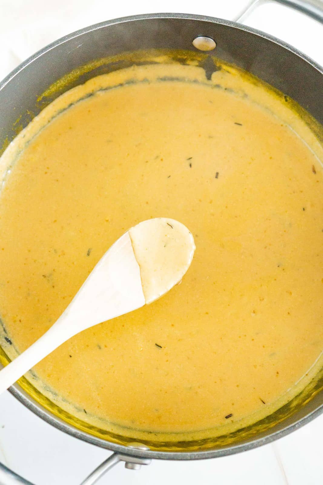 vegan cheesy sauce in a saucepan