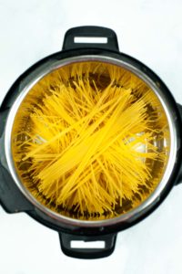 Uncooked spaghetti in an Instant Pot.