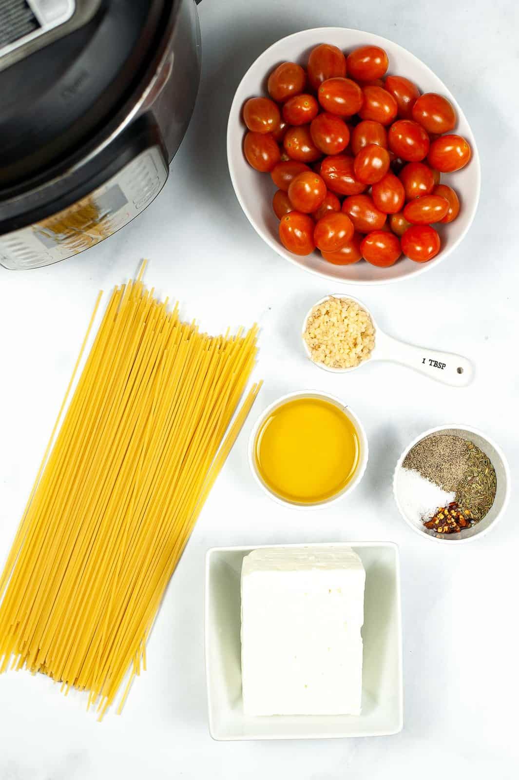 Ingredients to make vegan baked feta pasta. 