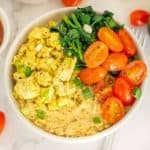 Loaded vegan oatmeal with tofu scramble in a bowl.