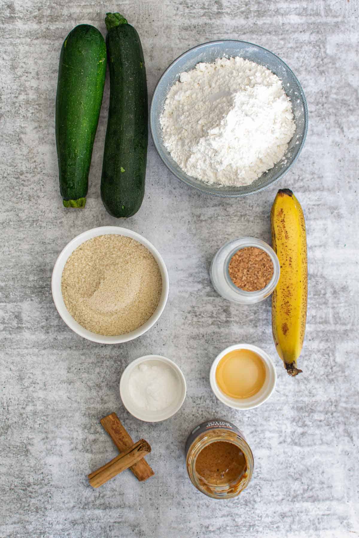 Ingredients to make zucchini muffins.