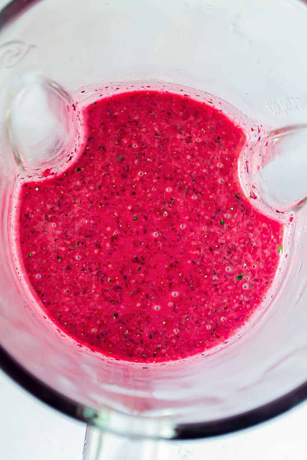 Blueberry dressing in a blender.