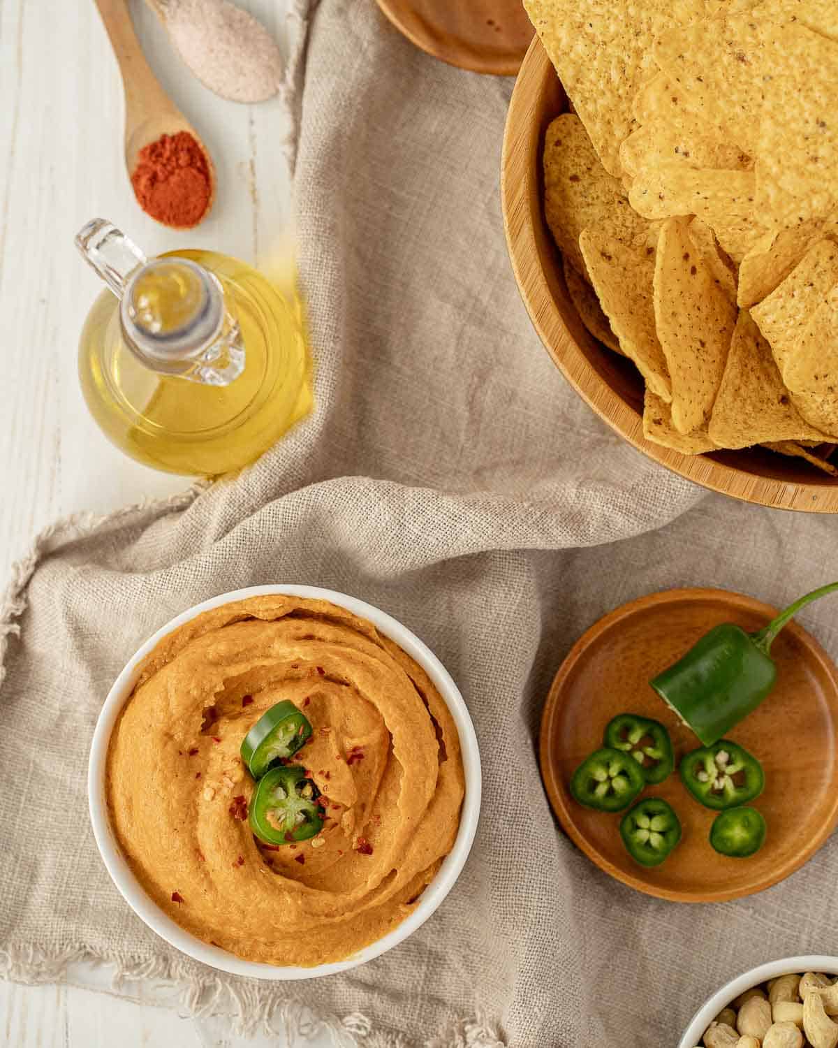 Vegan queso dip and chips spread.