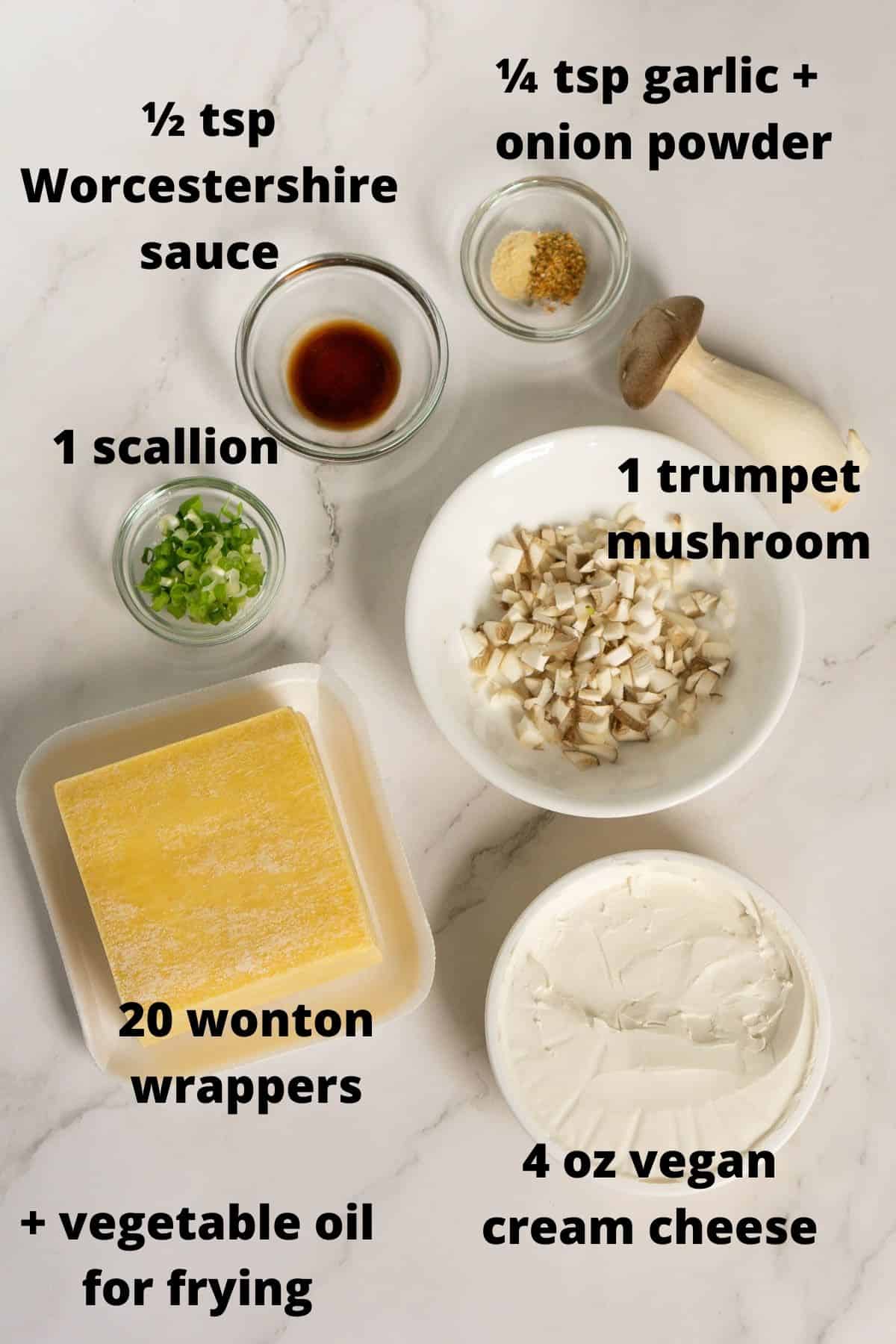 Ingredients to make vegan crab rangoon: wontons, vegan cream cheese, trumpet mushroom, scallion, Worcestershire sauce, spices.