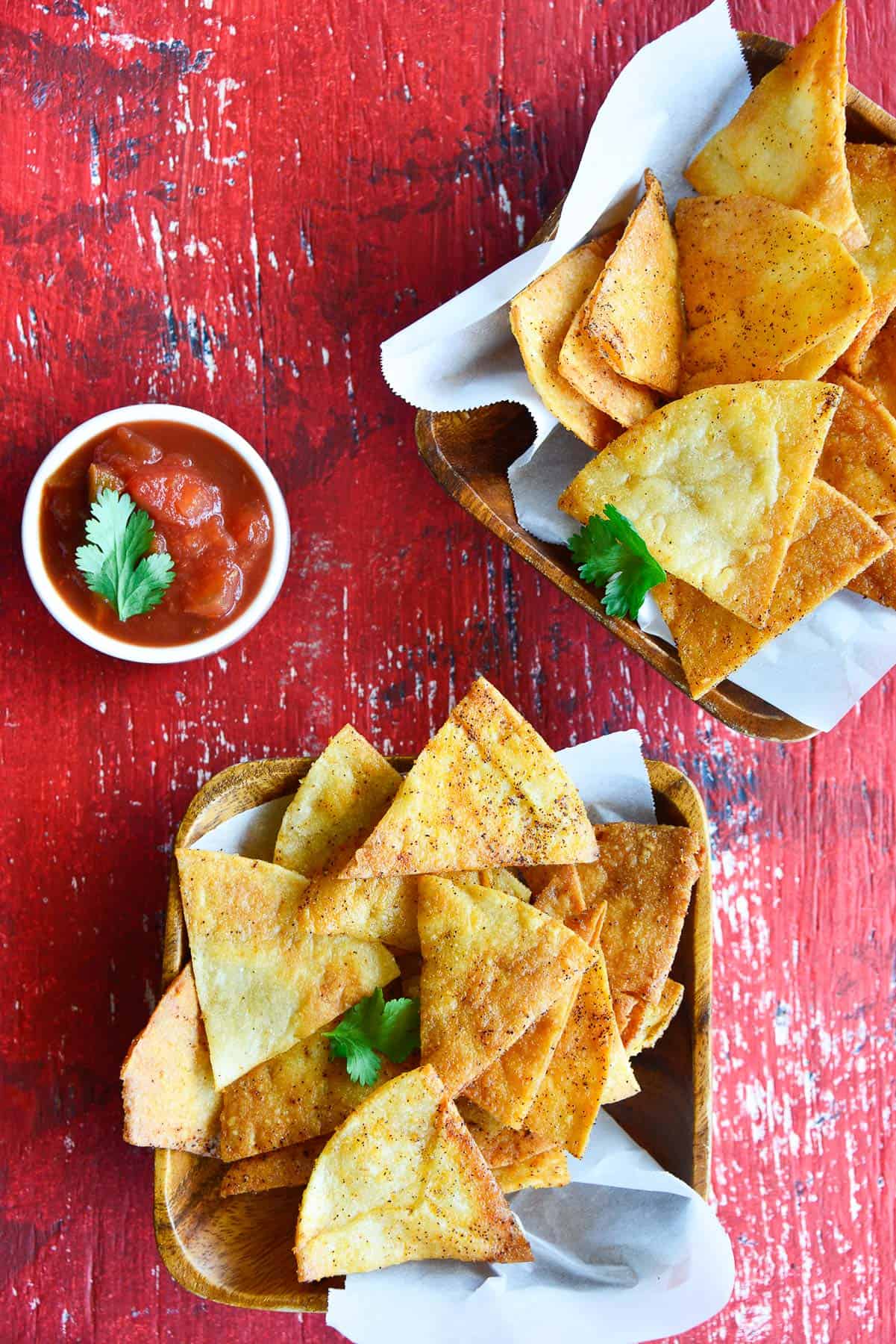 2 bowls of homemade tortilla chips with chipotle seasoning