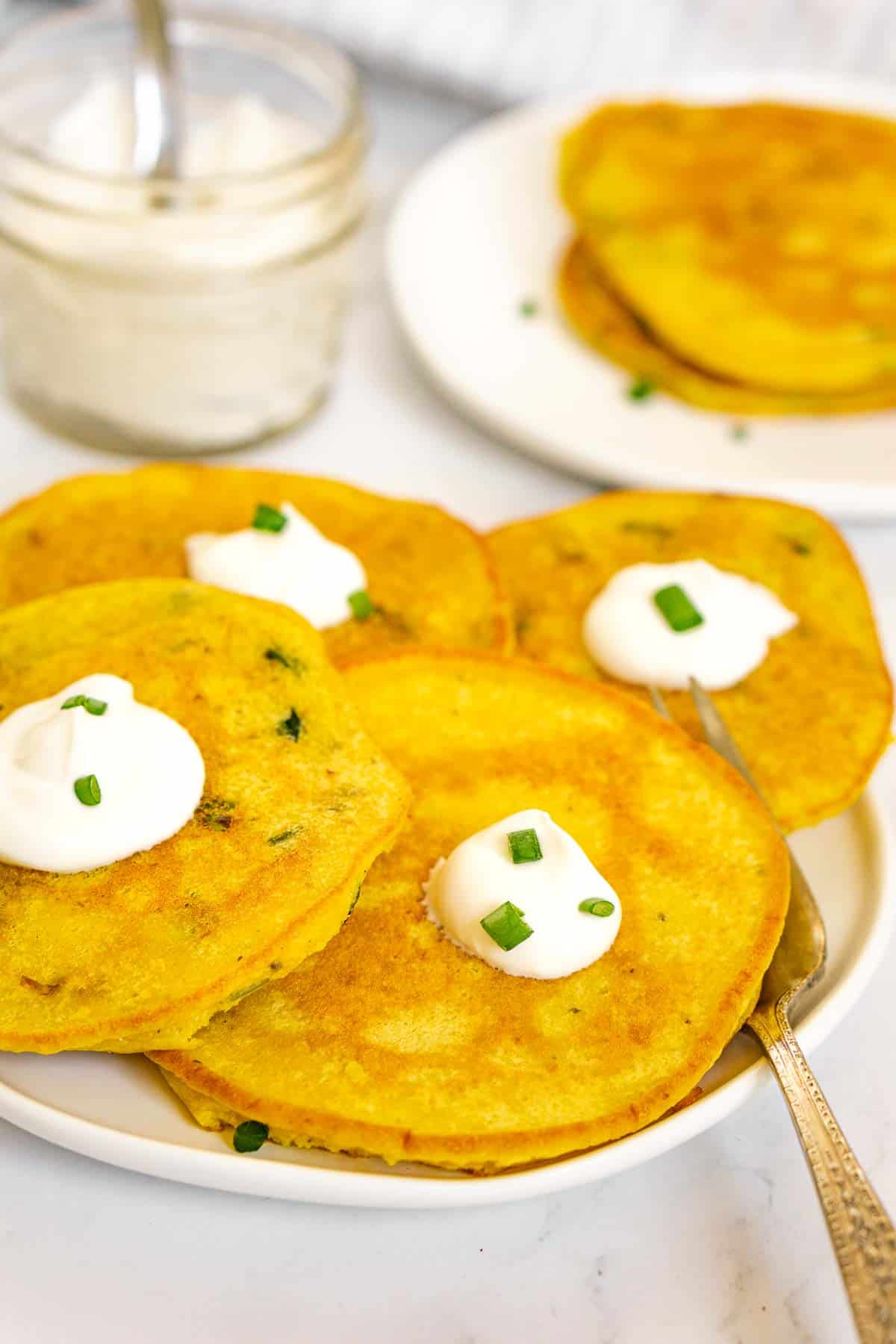 Plate of savory vegan pancakes from mung beans.