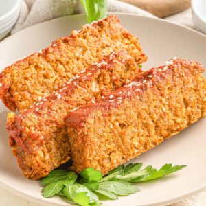 Sliced vegan rice loaf on a plate