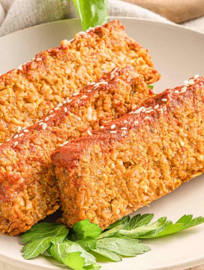 Sliced vegan rice loaf on a plate