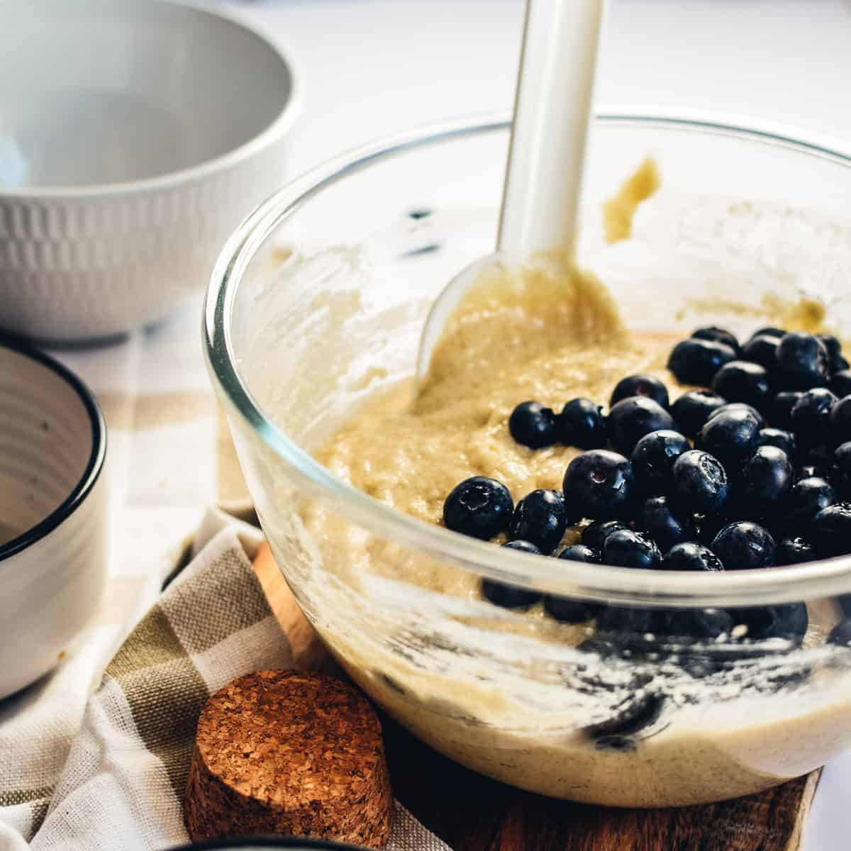 Adding blueberries to muffin batter