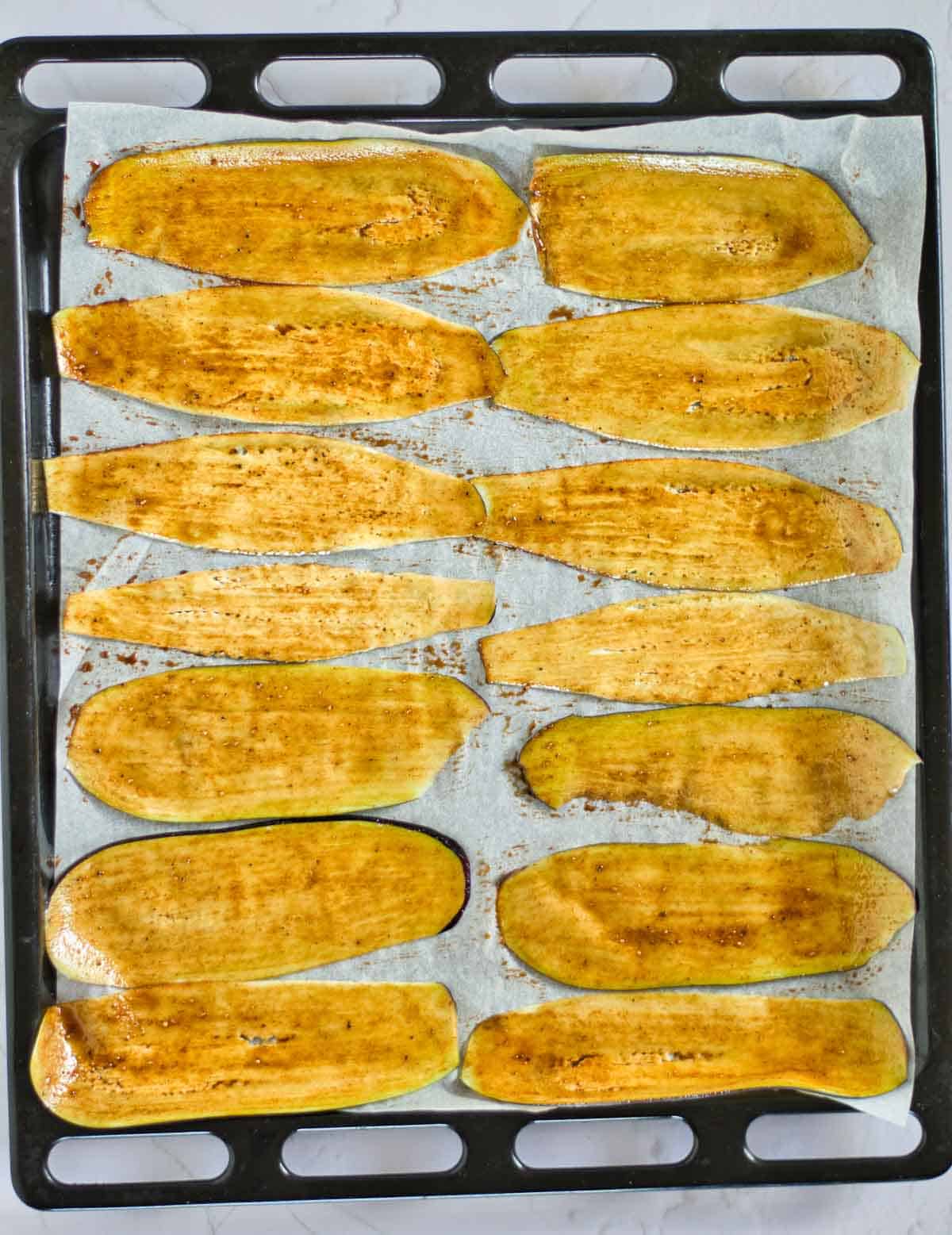Eggplant slices brushed with seasonings