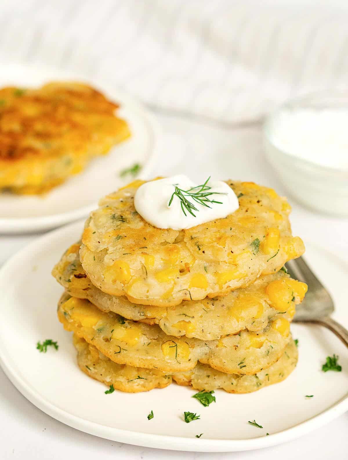 Vegan corn fritters on a plate