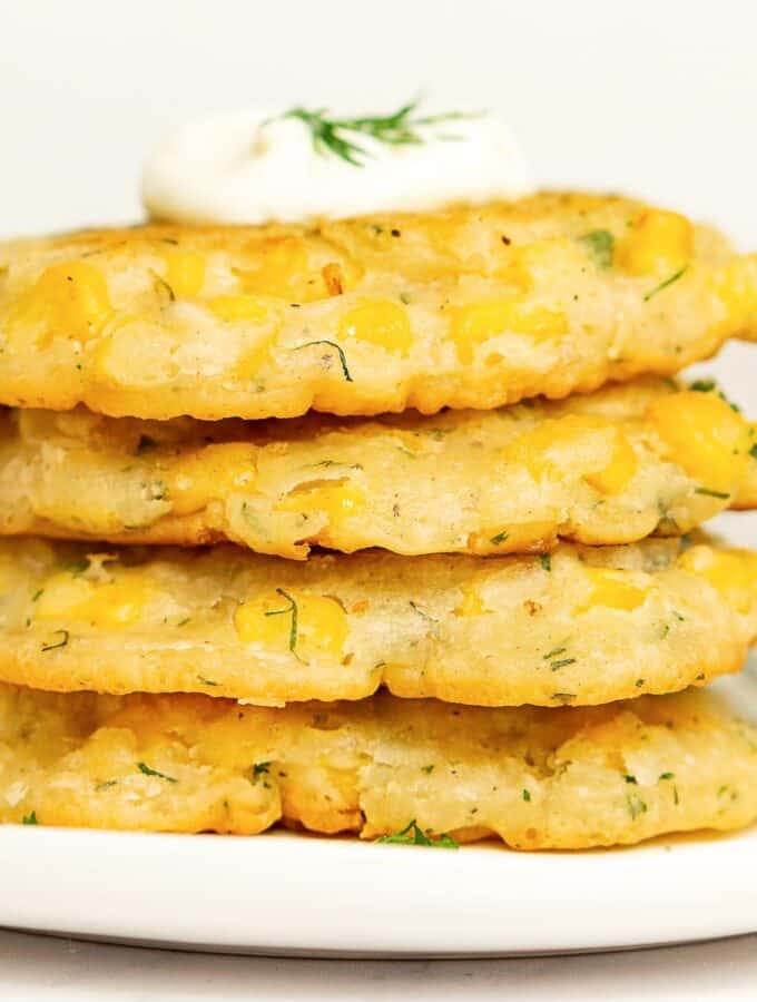 Stack of vegan corn fritters