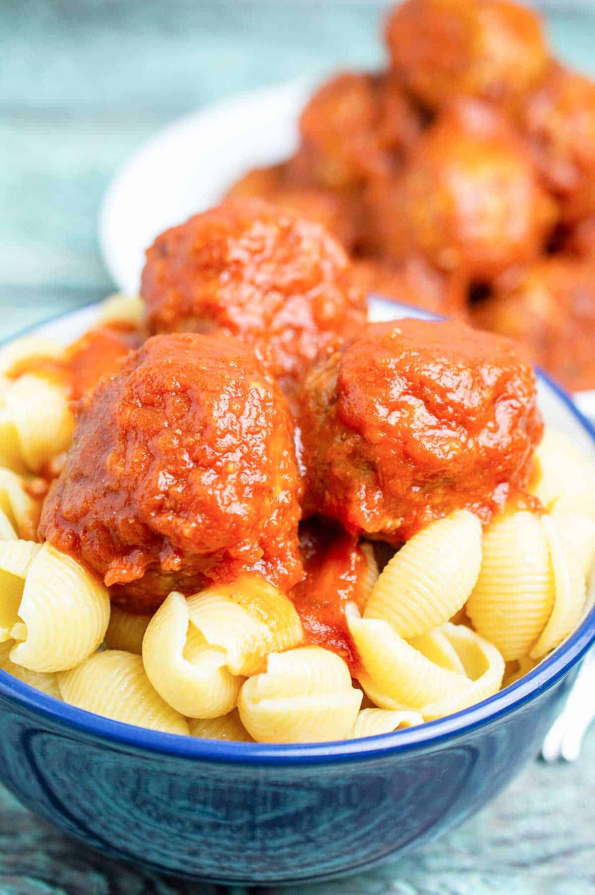 Vegan meatballs and sauce over pasta