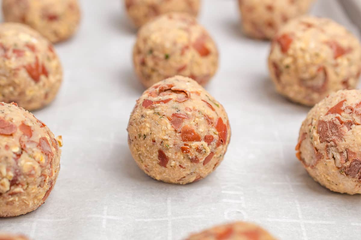 Uncooked meatless meatballs on a baking tray