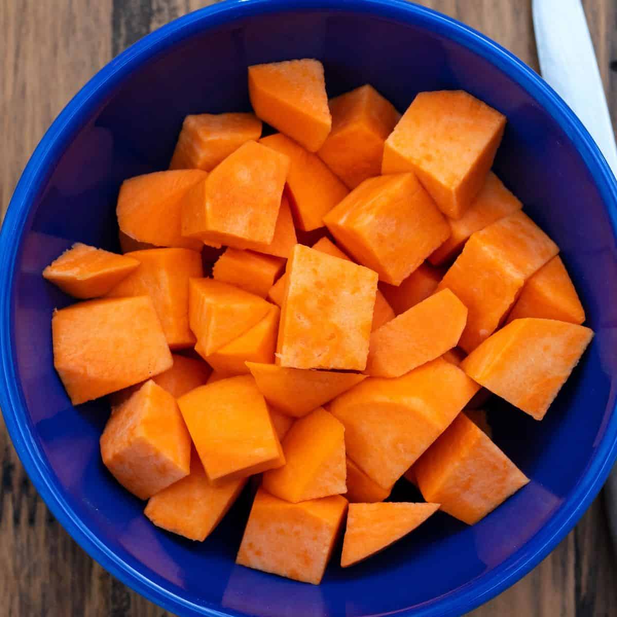 Cubed sweet potatoes in a bowl.