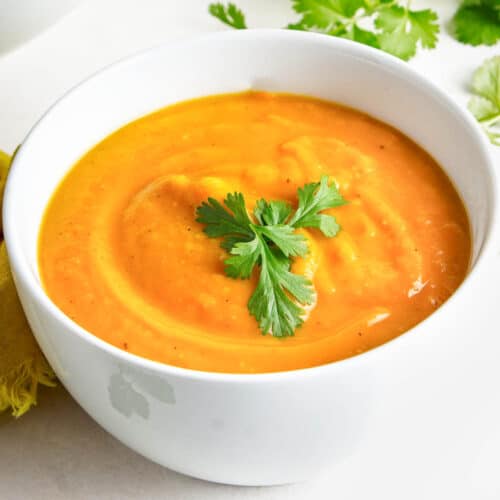 Close up of a bowl of vegan miso sweet potato soup.