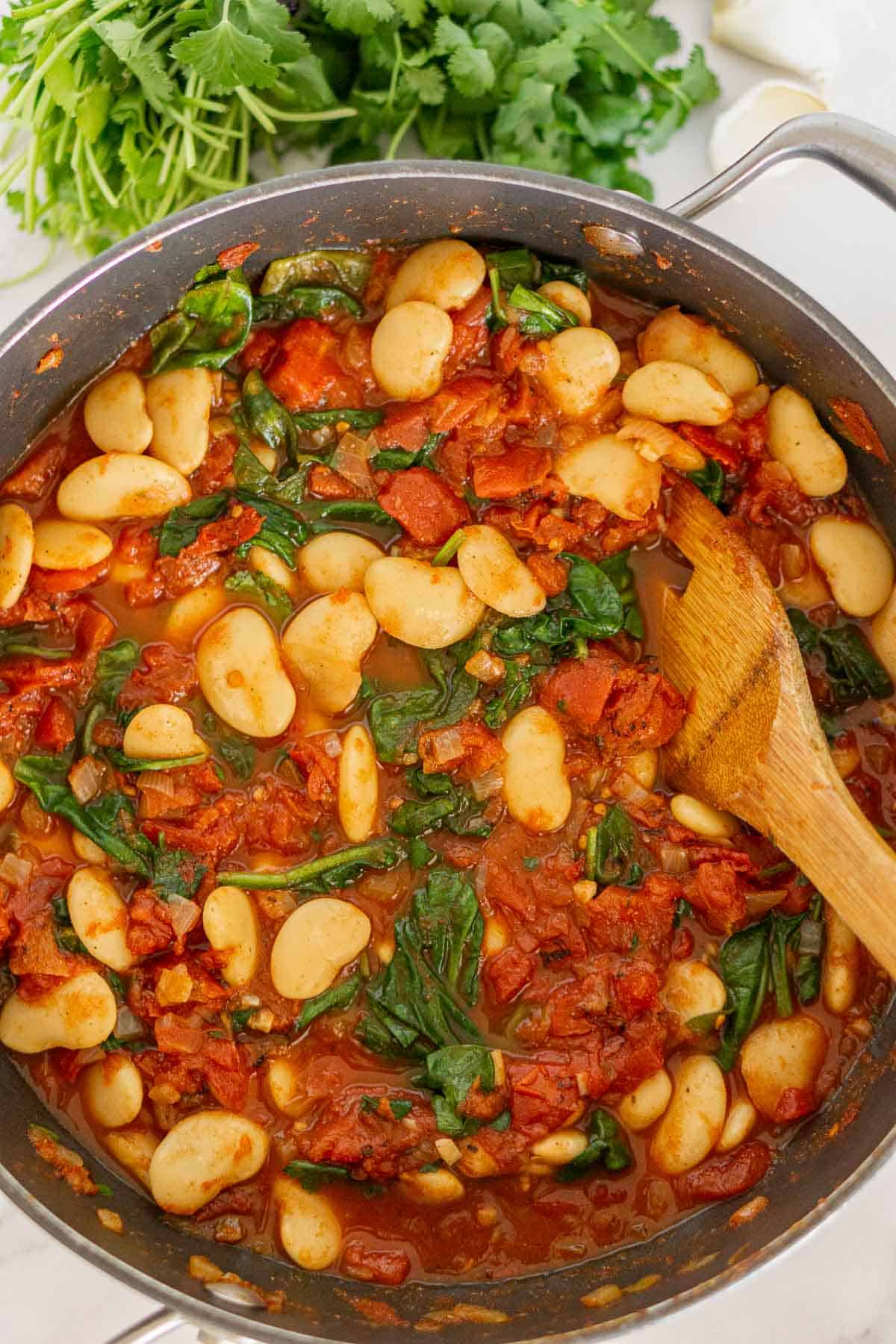 Butter bean stew with tomatoes in a pot