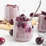 Jars of vegan cherry chia pudding with cherry compote
