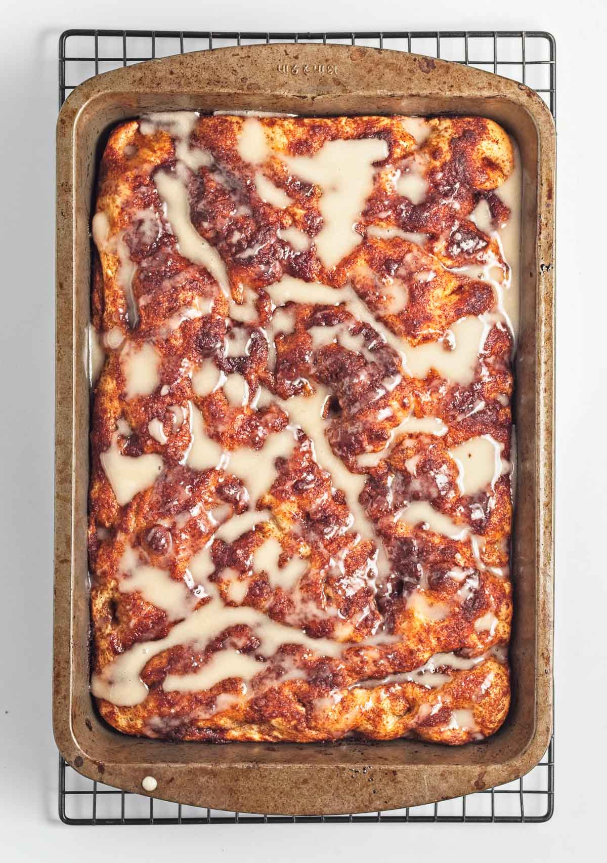 Cinnamon roll focaccia bread in baking pan