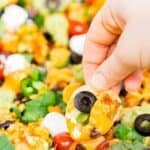 Pinterest image with text: the best loaded vegan nachos